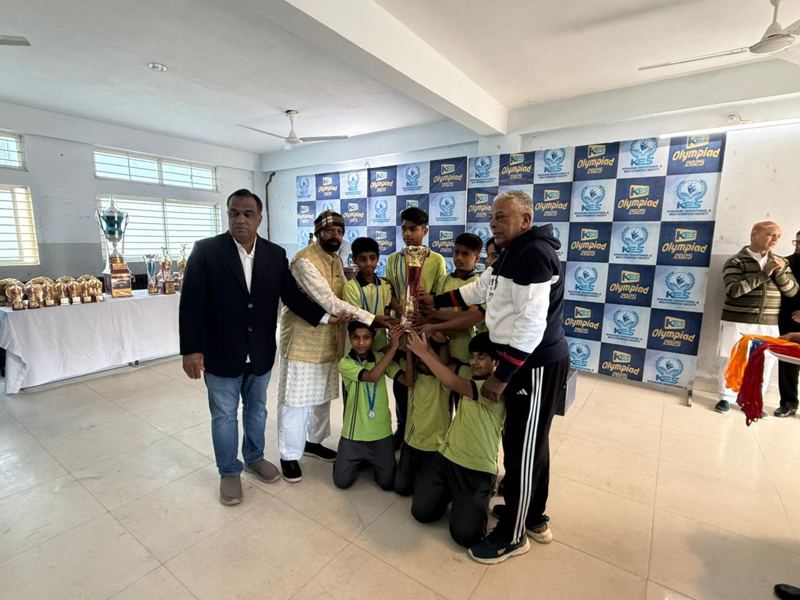 Al-Khair students receiving a trophy at the KES Olympiad 2025