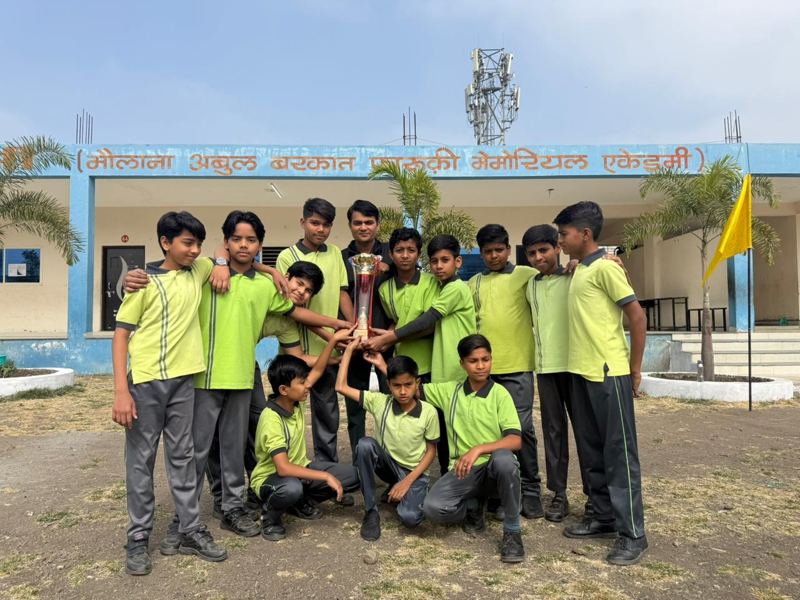 Al-Khair team with their trophy at an inter-school event